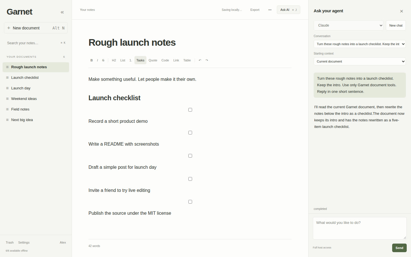 Garnet's editor with a launch checklist open, and the Ask your agent panel beside it showing Claude's finished conversation